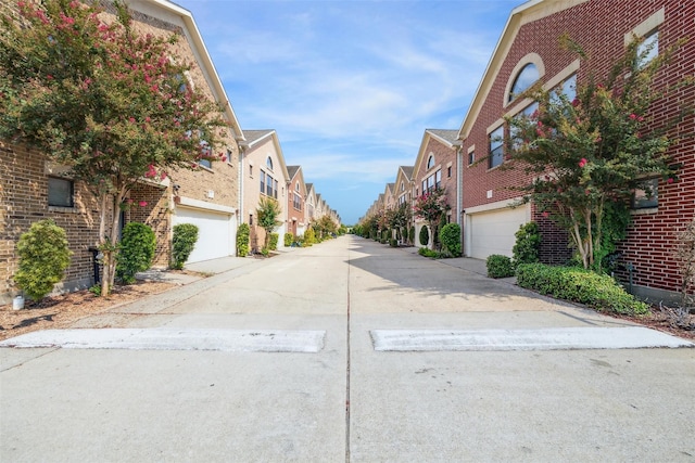 11315 S Main St Unit 1205, Houston, TX 77025 - view of concrete alley featuring a residential view