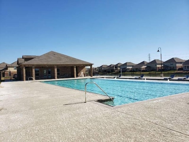 3543 Paganini Pl, Katy, TX 77493 - community pool with a patio and a residential view