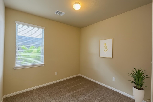 3543 Paganini Pl, Katy, TX 77493 - empty room with dark carpet and baseboards