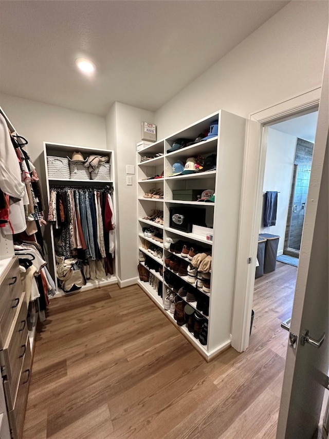 311 Eado Park Cir, Houston, TX 77020 - walk in closet with wood finished floors
