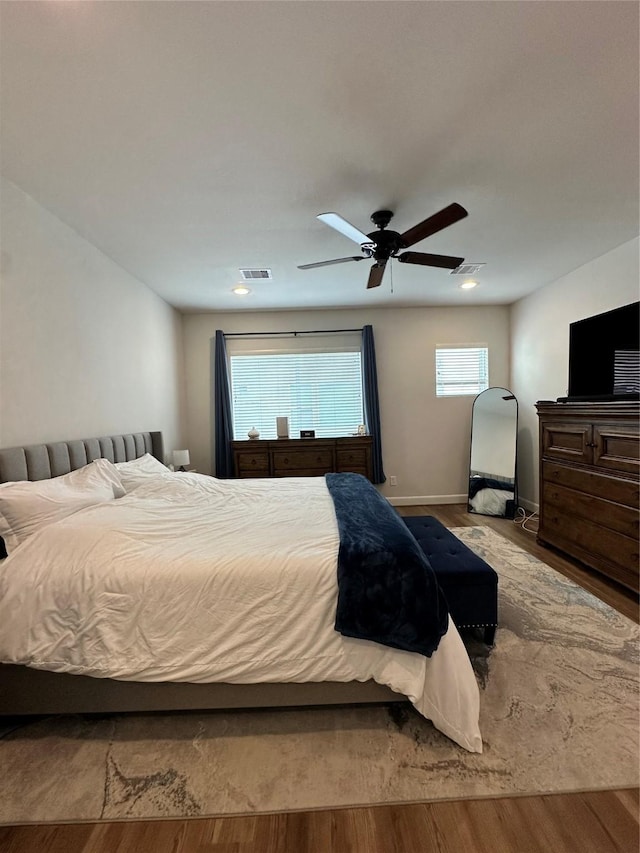 311 Eado Park Cir, Houston, TX 77020 - bedroom with wood finished floors, ceiling fan, and recessed lighting