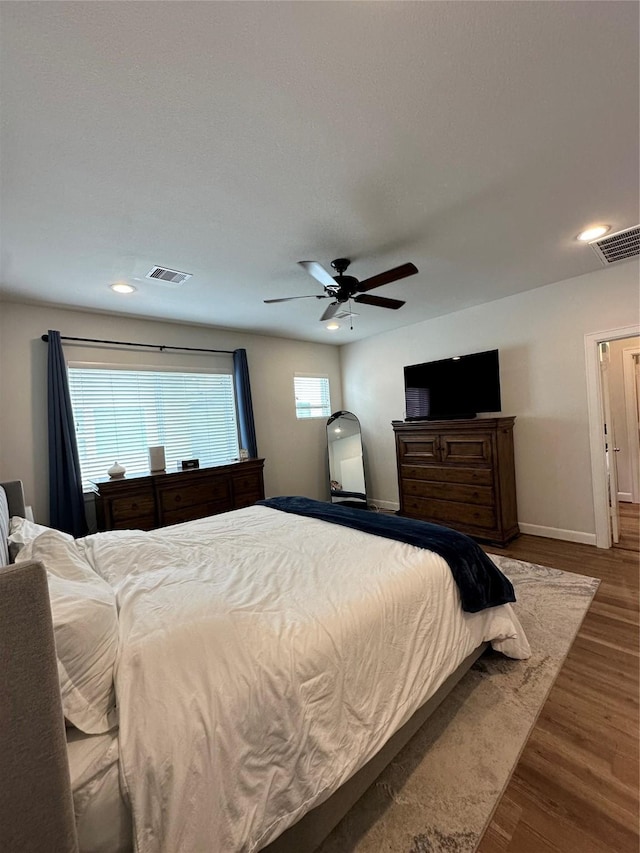311 Eado Park Cir, Houston, TX 77020 - bedroom featuring recessed lighting, wood finished floors, and a ceiling fan