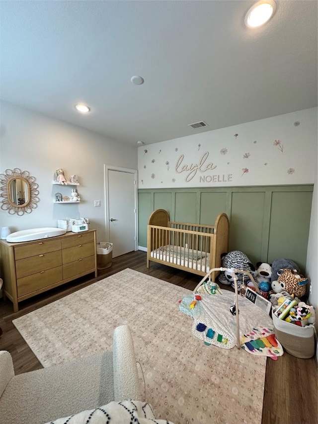 311 Eado Park Cir, Houston, TX 77020 - bedroom featuring dark wood-style floors and recessed lighting