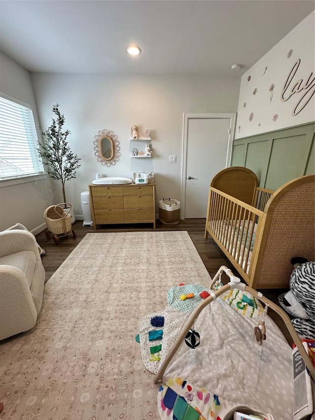 311 Eado Park Cir, Houston, TX 77020 - bedroom with wood finished floors, a nursery area, and recessed lighting