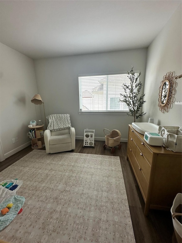 311 Eado Park Cir, Houston, TX 77020 - living area featuring dark wood-type flooring and baseboards