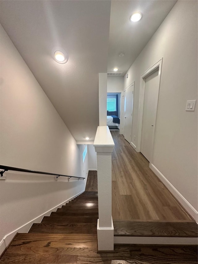 311 Eado Park Cir, Houston, TX 77020 - stairs with wood finished floors and recessed lighting