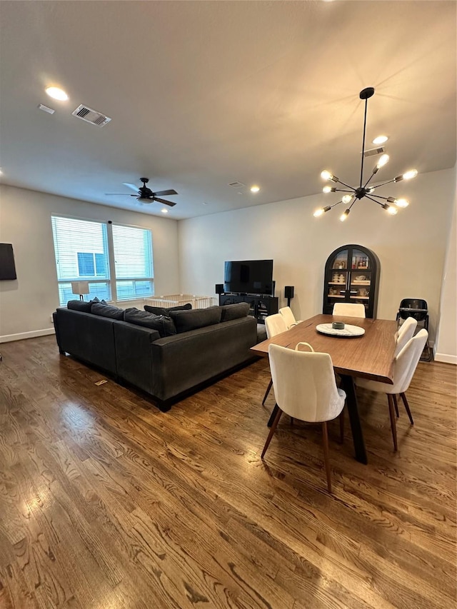 311 Eado Park Cir, Houston, TX 77020 - dining room featuring dark wood-style floors, a chandelier, recessed lighting, and ceiling fan