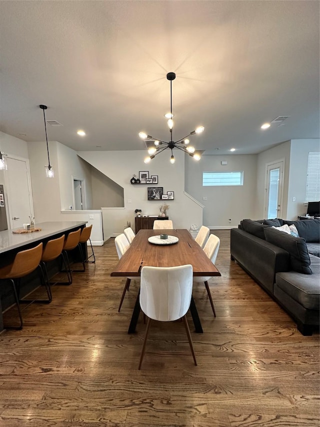 311 Eado Park Cir, Houston, TX 77020 - dining room featuring a chandelier, dark wood-style flooring, and recessed lighting