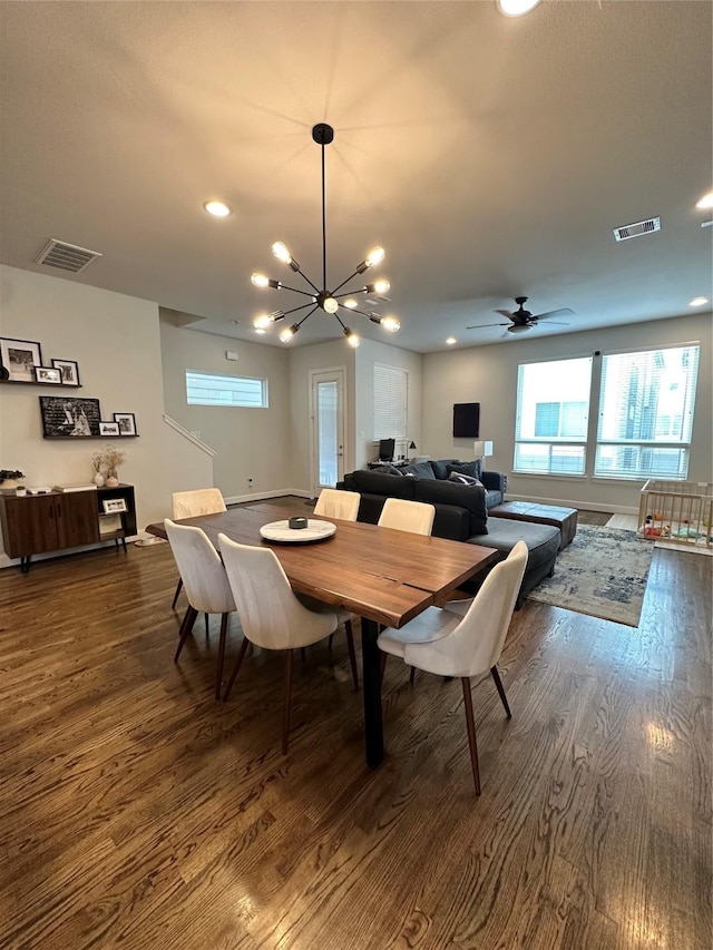 311 Eado Park Cir, Houston, TX 77020 - dining room with dark wood finished floors, plenty of natural light, a chandelier, and recessed lighting