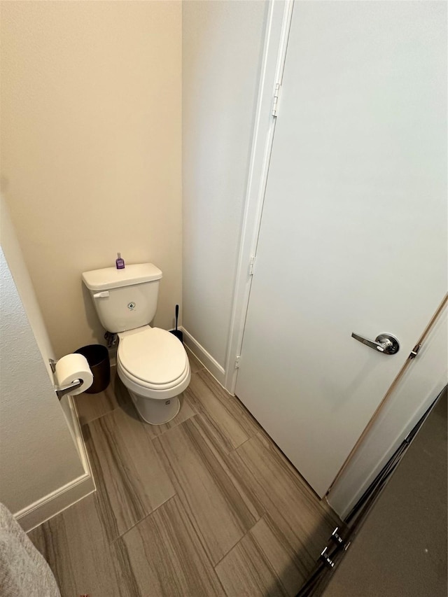 311 Eado Park Cir, Houston, TX 77020 - bathroom featuring toilet and baseboards