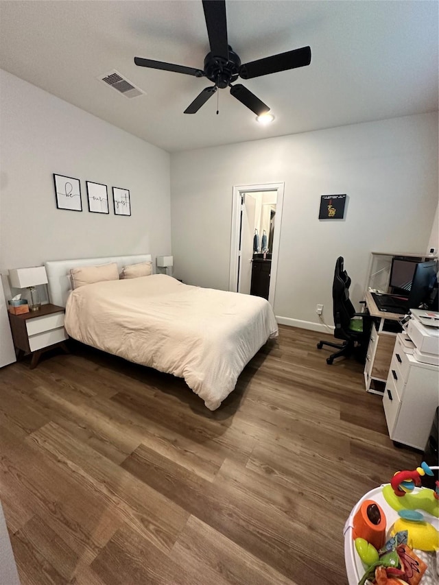 311 Eado Park Cir, Houston, TX 77020 - bedroom featuring dark wood-style floors and a ceiling fan