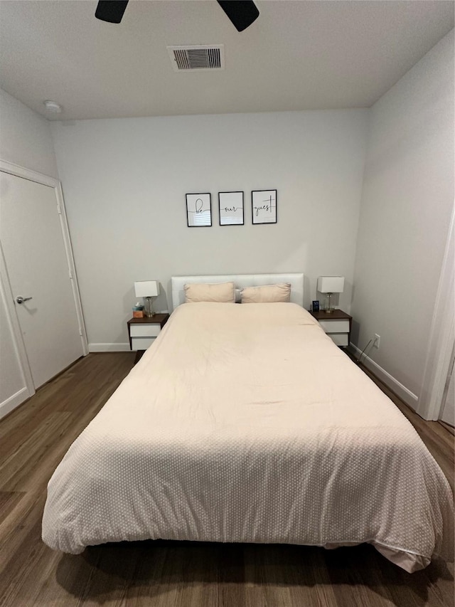 311 Eado Park Cir, Houston, TX 77020 - bedroom featuring dark wood-style floors and a ceiling fan