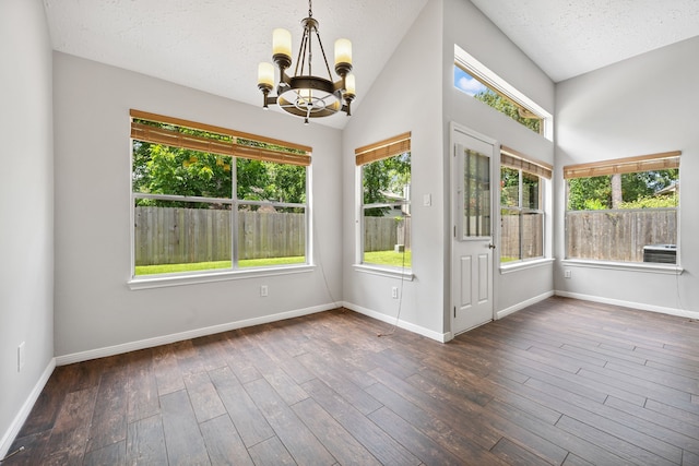 3518 Grove Oaks Dr, Houston, TX 77339 - unfurnished sunroom with a chandelier and lofted ceiling