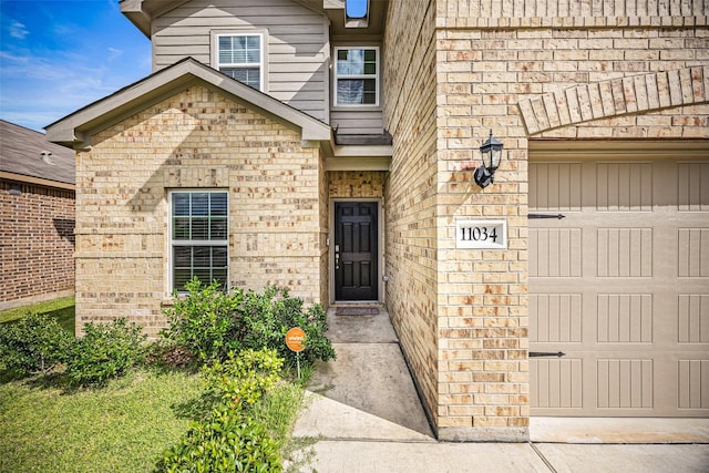 11034 Hillside Creek Dr, Humble, TX 77396 - doorway to property featuring brick siding