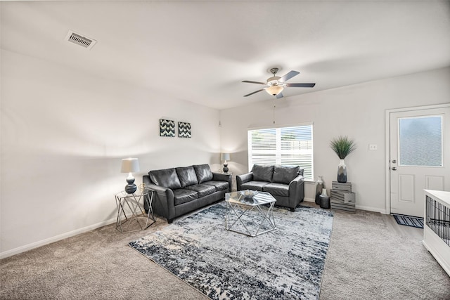 11034 Hillside Creek Dr, Humble, TX 77396 - carpeted living room with a ceiling fan and baseboards
