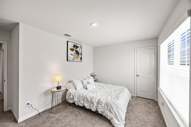 11034 Hillside Creek Dr, Humble, TX 77396 - carpeted bedroom with baseboards and recessed lighting