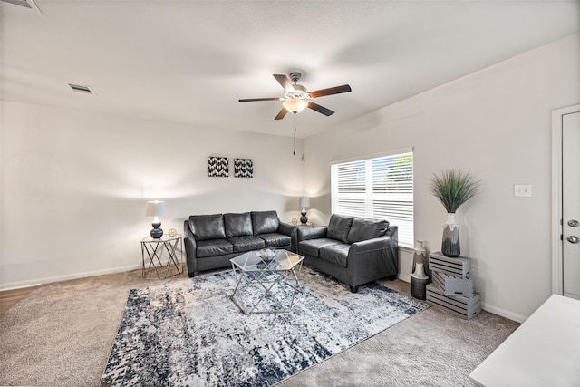 11034 Hillside Creek Dr, Humble, TX 77396 - carpeted living area featuring ceiling fan and baseboards