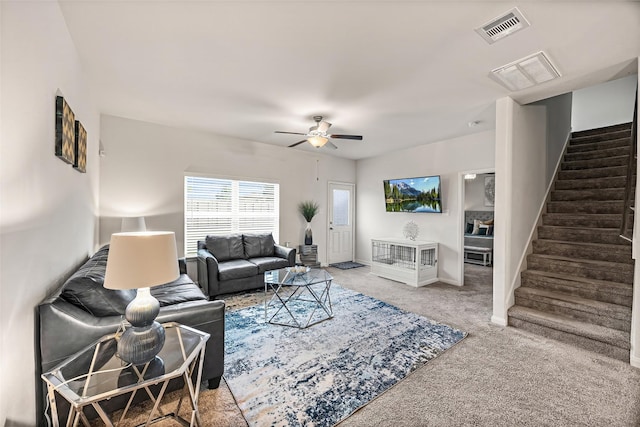 11034 Hillside Creek Dr, Humble, TX 77396 - living area with stairs, carpet, and ceiling fan