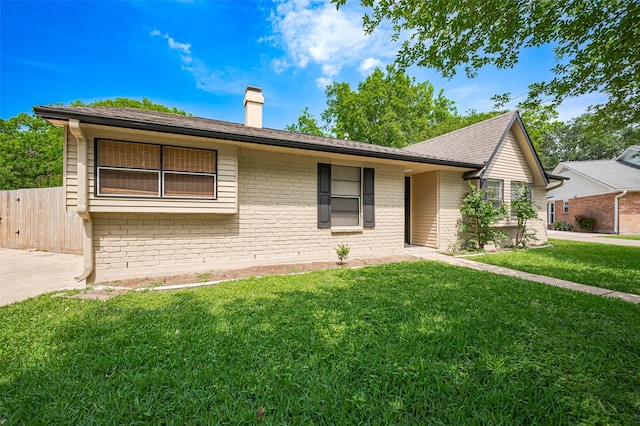 13506 Sherwood St, Sugar Land, TX 77498 - single story home with brick siding and a chimney