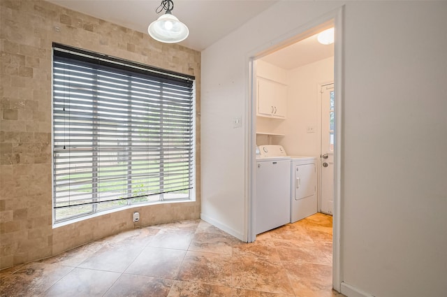 13506 Sherwood St, Sugar Land, TX 77498 - washroom featuring washing machine and dryer and cabinet space