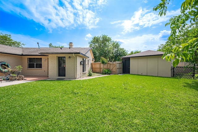 13506 Sherwood St, Sugar Land, TX 77498 - view of yard with a patio and a gate