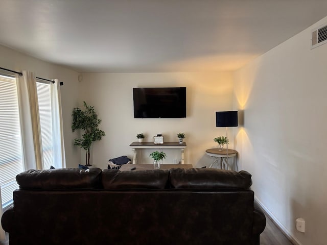 1529 Wirt Rd Unit 6, Houston, TX 77055 - living room featuring baseboards and wood finished floors