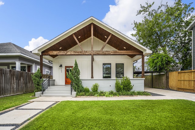 703 Dumble St, Houston, TX 77023 - view of front of home featuring board and batten siding