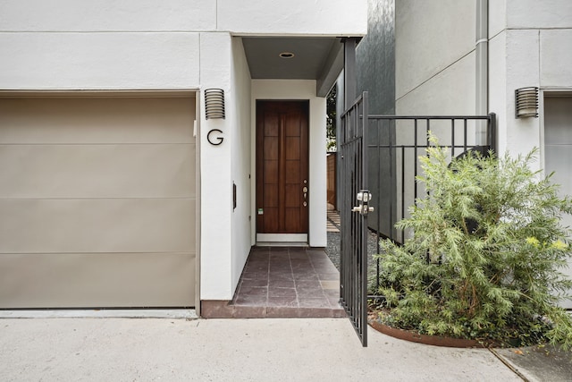 2010 Blodgett St Unit G, Houston, TX 77004 - doorway to property with a gate and stucco siding