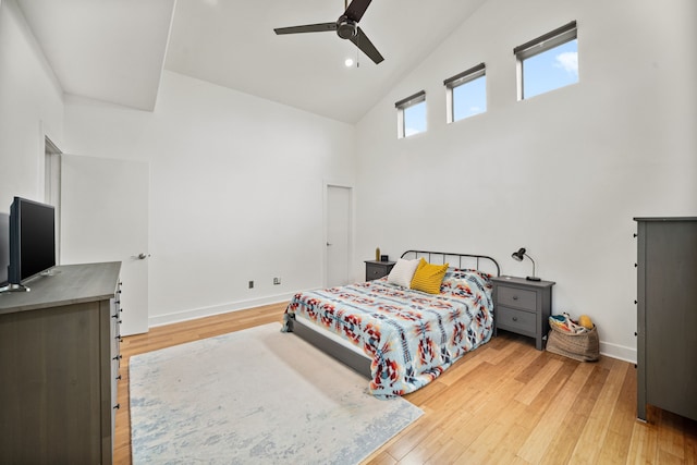 2010 Blodgett St Unit G, Houston, TX 77004 - bedroom featuring high vaulted ceiling, light wood-style flooring, and a ceiling fan