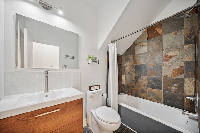 2010 Blodgett St Unit G, Houston, TX 77004 - bathroom featuring vanity, shower / bathtub combination with curtain, tasteful backsplash, and vaulted ceiling