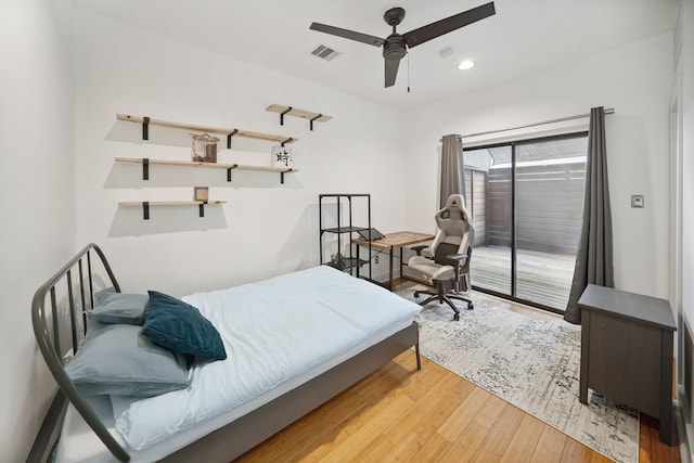 2010 Blodgett St Unit G, Houston, TX 77004 - bedroom featuring access to exterior, wood finished floors, a ceiling fan, and recessed lighting