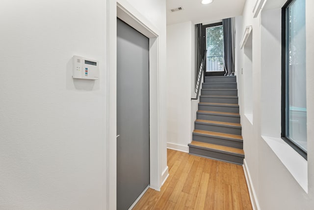 2010 Blodgett St Unit G, Houston, TX 77004 - corridor with light wood-style floors, stairs, and recessed lighting