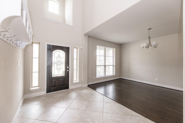 2131 Blossomcrown Dr, Katy, TX 77494 - entryway with a chandelier and tile patterned flooring