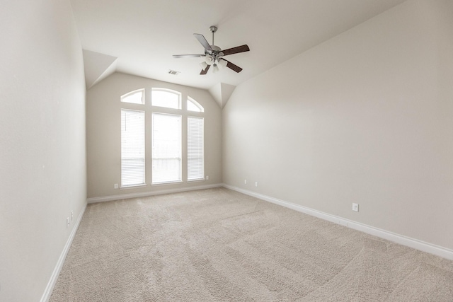 2131 Blossomcrown Dr, Katy, TX 77494 - spare room featuring a ceiling fan, light colored carpet, and vaulted ceiling