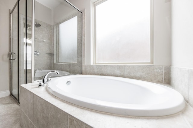 2131 Blossomcrown Dr, Katy, TX 77494 - bathroom featuring healthy amount of natural light, a stall shower, and a bath