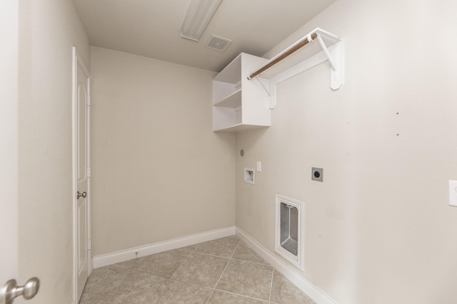 2131 Blossomcrown Dr, Katy, TX 77494 - laundry area featuring electric dryer hookup, washer hookup, and light tile patterned floors