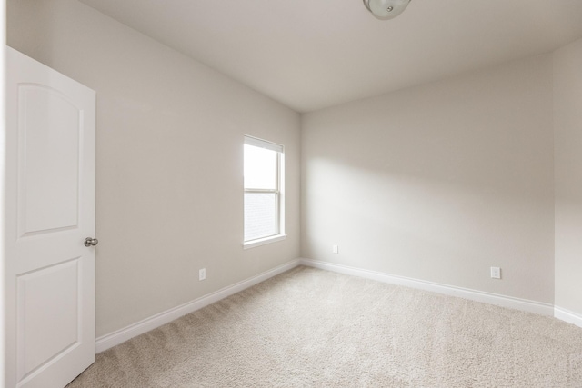 2131 Blossomcrown Dr, Katy, TX 77494 - empty room with baseboards and light carpet