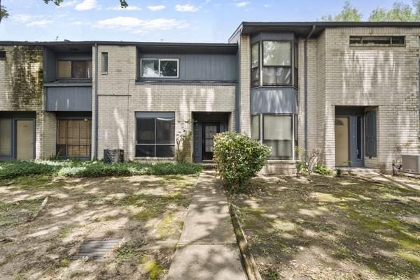 9005 Imogene St Unit C, Houston, TX 77036 - view of front facade with brick siding
