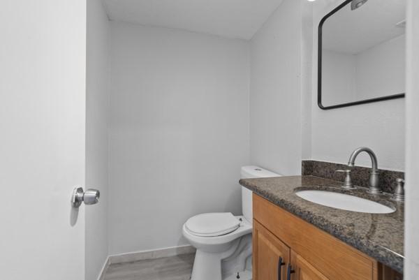 9005 Imogene St Unit C, Houston, TX 77036 - half bathroom with toilet and vanity