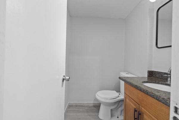 9005 Imogene St Unit C, Houston, TX 77036 - bathroom with vanity and wood finished floors