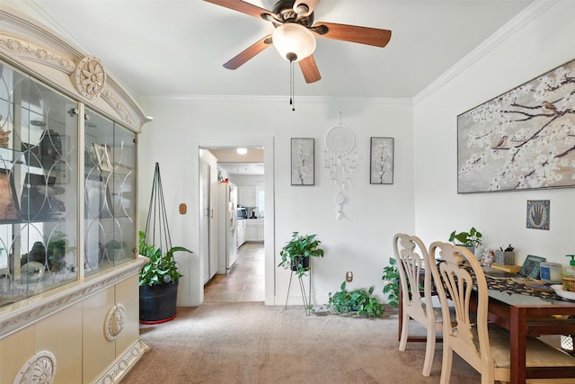 619 10th St, Hempstead, TX 77445 - office area featuring light carpet, ceiling fan, and crown molding