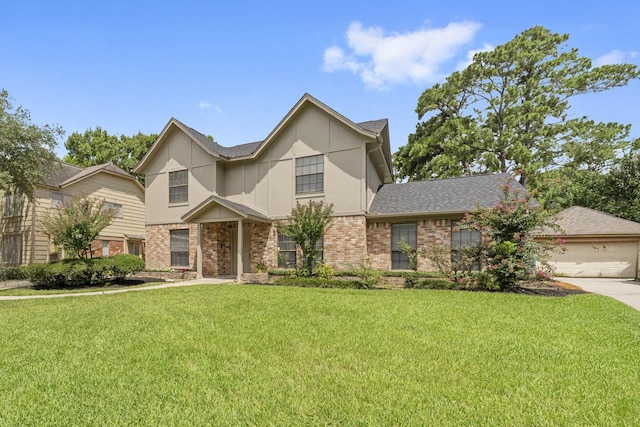 2811 Blue Glen Ln, Houston, TX 77073 - view of front of house with brick siding, a front lawn, driveway, and roof with shingles