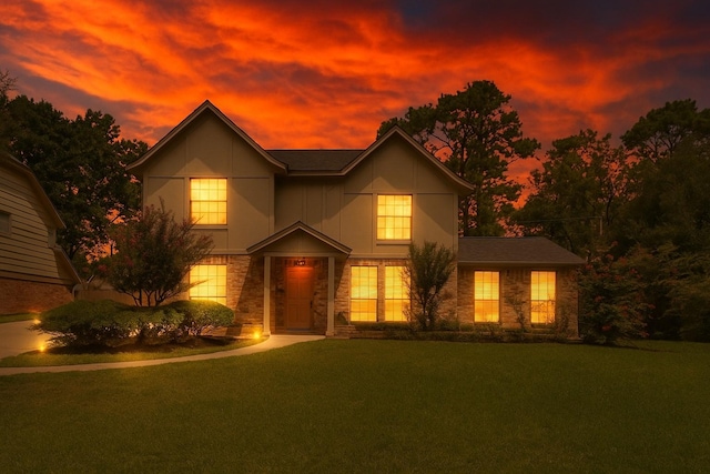 2811 Blue Glen Ln, Houston, TX 77073 - traditional-style house featuring stone siding and a yard