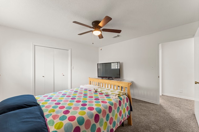 2811 Blue Glen Ln, Houston, TX 77073 - carpeted bedroom featuring a closet and a ceiling fan