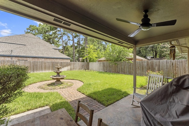 2811 Blue Glen Ln, Houston, TX 77073 - fenced backyard featuring ceiling fan and a patio