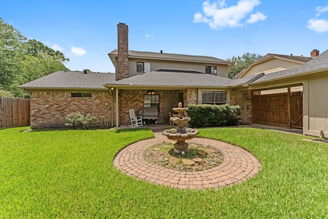 2811 Blue Glen Ln, Houston, TX 77073 - rear view of property featuring brick siding, a chimney, and a shingled roof