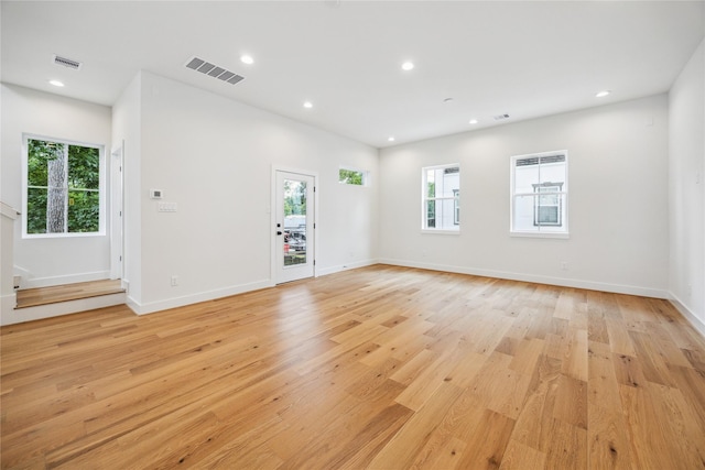5506B Wheatley St, Houston, TX 77091 - empty room with light wood-style floors and recessed lighting