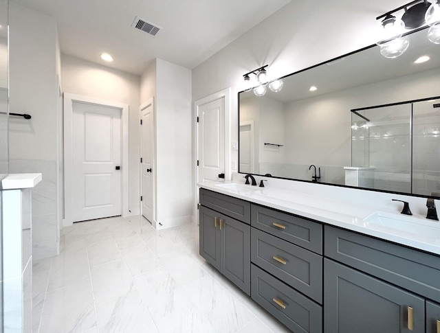 5506B Wheatley St, Houston, TX 77091 - bathroom with a shower stall, double vanity, recessed lighting, and marble finish flooring