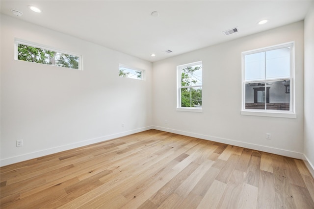 5506B Wheatley St, Houston, TX 77091 - empty room featuring light wood-style flooring, recessed lighting, and a smoke detector