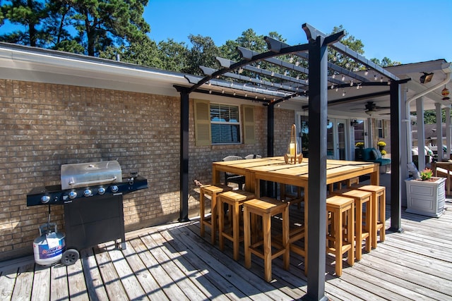 150 Edgewater Way, Point Blank, TX 77364 - wooden terrace featuring a pergola, grilling area, ceiling fan, and outdoor dining space